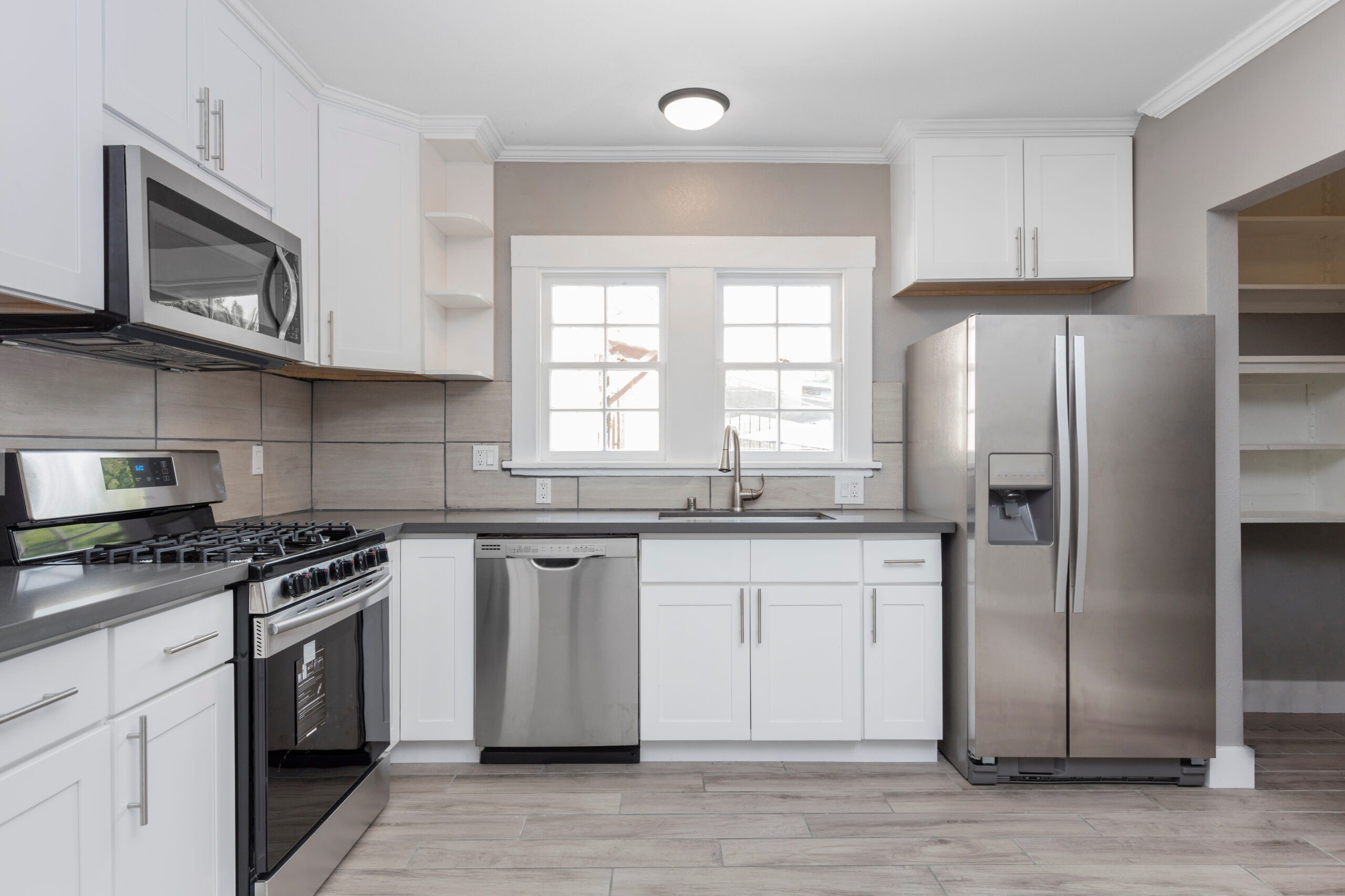 Kitchens in white new, with granite counter-tops, stove and stai Kitchen appliances North Wilkesboro, NC